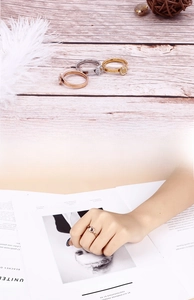 Detailed look at stackable hexagonal rings with pavé crystals in rose gold, silver, and gold