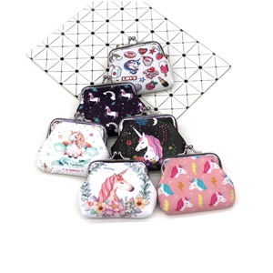Detailed macro view of unicorn print canvas coin purses with vintage metal clasp closure