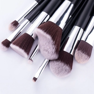 10-piece professional makeup brush set with gradient bristles on a white background