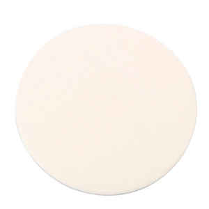 Top view of cream white knitted wool beret showing detailed texture and stitching