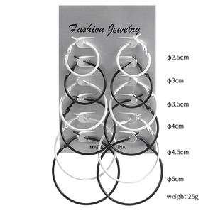 Set of six pairs of round hoop earrings in black and white sizes 2.5cm to 5cm