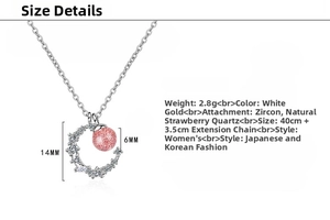 Detail view of crescent moon pendant with strawberry quartz and sizing measurements