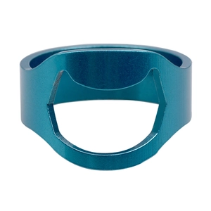 Close-up of creative blue plated stainless steel ring bottle opener in a studio setting