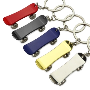 Creative metal finger skateboard keychains in red, black, blue, gold, and silver finishes