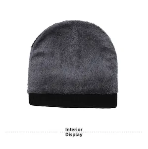Detail view of winter knitted hat featuring thick grey fleece lining for warmth