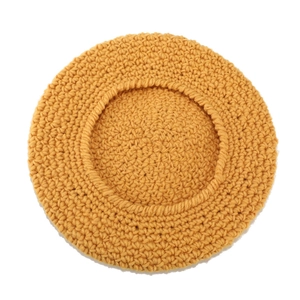 Mustard yellow hand-knitted beret with retro octagonal texture in chunky crochet style