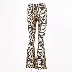 Detail of high waist leopard print flare pants showing texture and elastic fabric material