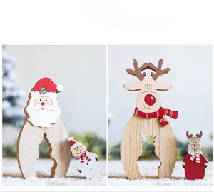 Detailed view of handcrafted Nordic wooden Christmas reindeer and Santa desktop ornaments