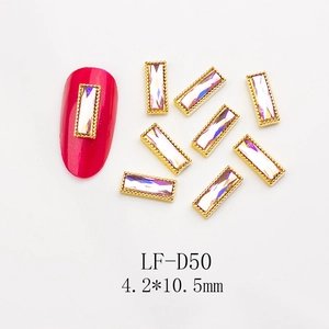 Detail view of aurora crystal nail charm with gold metal edge, 4.2x10.5mm size