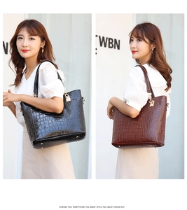Fashionable tote bags in black and brown crocodile texture shown with models on white wall