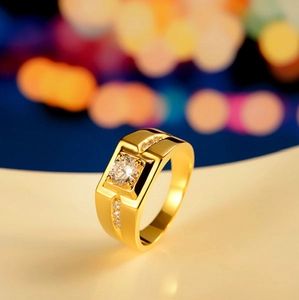 Close-up of gold plated ring with round clear center stone and diamond side accents