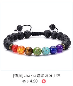 Close-up of natural lava stone and seven chakra beads on an adjustable woven bracelet