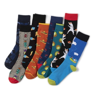 Colorful combed cotton crew socks with creative animal and fruit patterns in flat lay