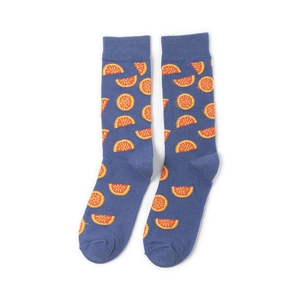 Detail of blue cotton crew socks featuring vibrant orange slice knit patterns