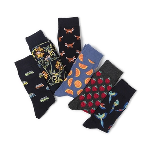 Set of 6 cotton blend crew socks with fun animal, fruit, and floral patterns in colorful box