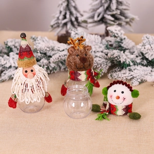 Christmas clear candy jars with Santa, Reindeer and Snowman plush decorative tops