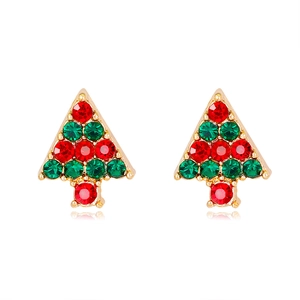 Macro detail of Christmas tree stud earrings with vibrant red and green rhinestones