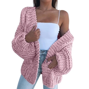 Detailed view of pink thick mohair knit cardigan texture and chunky stitching on the sleeve