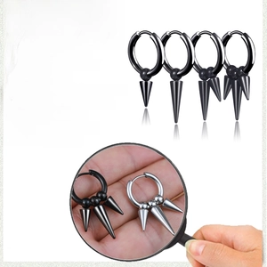 Macro view showing the polished finish and sharp spike detail of the stainless steel earring