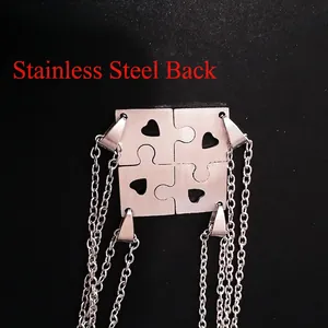 Stainless steel best friends forever puzzle heart necklaces shown from the back view