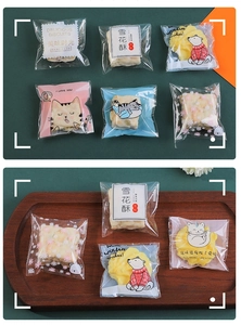 Clear plastic packaging bags with cartoon prints for biscuits, candy, and snacks