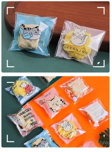 Detail view of clear self-adhesive bags with festive winter motifs for cookies and candy