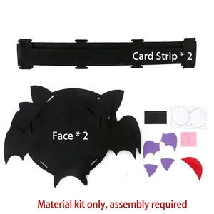 DIY Halloween bat candy bag craft kit with black felt pieces and colorful accessories
