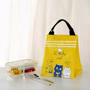 Insulated yellow lunch bag with cartoon cats including glass bento box and cutlery set