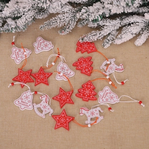 Christmas wooden hanging ornaments set with star tree horse shapes on burlap background