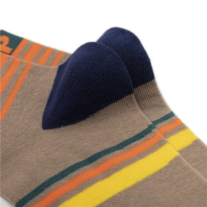 Detailed macro shot of reinforced heel and multi-color striped knit fabric on cotton socks