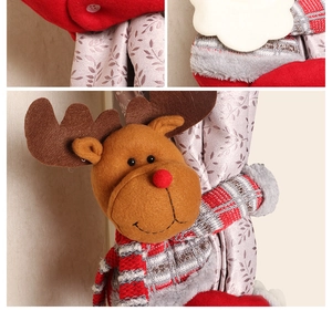 Detail of Christmas reindeer curtain buckle showing plush texture and festive stitching