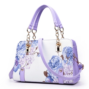Chic purple and white shell handbag with floral prints and detachable gold strap