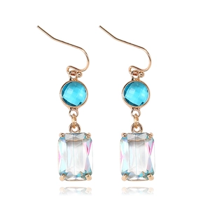 Blue and iridescent gradient K9 crystal drop earrings with rose gold hooks on white background