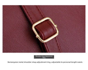 Detail of adjustable golden metal buckle on burgundy cross-grain leather handbag strap