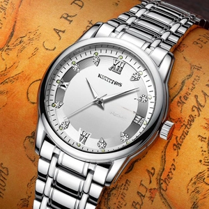 Macro detail of men's steel watch with Roman numerals and diamonds on vintage map background