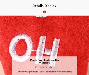 Macro shot of premium red felt fabric with high quality white embroidery and dense stitching