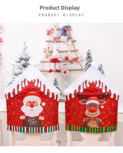 Detailed view of Santa and reindeer Christmas chair covers on white chairs for home decor