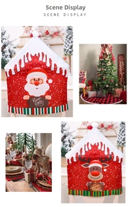 Detail of Santa and reindeer chair covers with Warm Wishes sign for holiday decor
