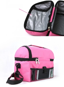 Detail showing height extension and internal insulation foil of the rose red lunch bag