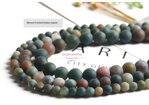 Macro shot of matte Indian Agate natural stone beads for DIY jewelry making