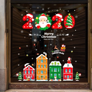 Removable Santa Claus and Christmas tree wall stickers on a glass window display