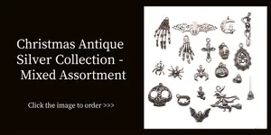 Detailed collection of antique silver Halloween charms including skulls, bats and pumpkins
