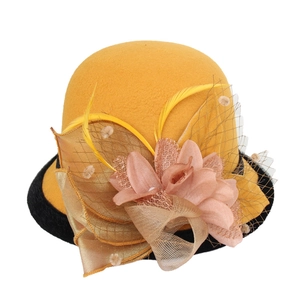 Elegant wool felt cloche hat for women with yellow crown, black brim and feather accents