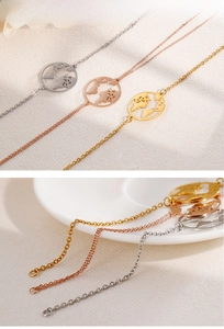 Detailed view of hollow world map pendants in gold, silver, and rose gold finishes