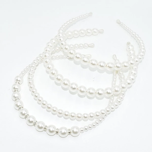 Elegant white faux pearl headbands with rhinestone accents for wedding and bridal accessories
