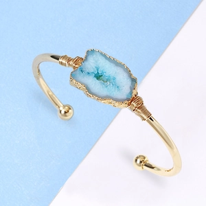 Handmade open gold cuff bracelet with natural blue druzy agate stone and wire wrapping
