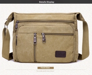 Detailed macro view of khaki canvas crossbody bag with multiple front zipper pockets