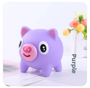 Close-up of a purple squeeze pig toy on a decorative garden background for stress relief