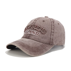 Close-up of vintage washed coffee baseball cap with Cyprus Island letter embroidery