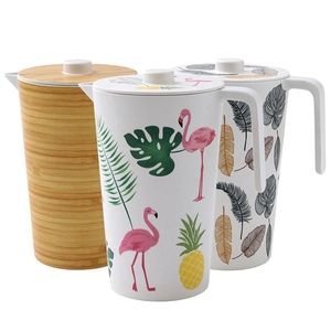 Bamboo fiber pitchers with eco-friendly wood grain and tropical prints in a set of three